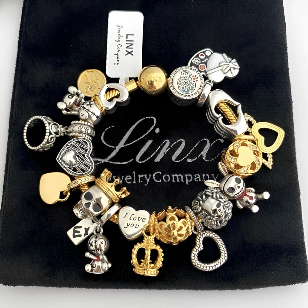 Linx Yellow Gold Snake Chain Bracelet with Skull and Heart Themed Charms